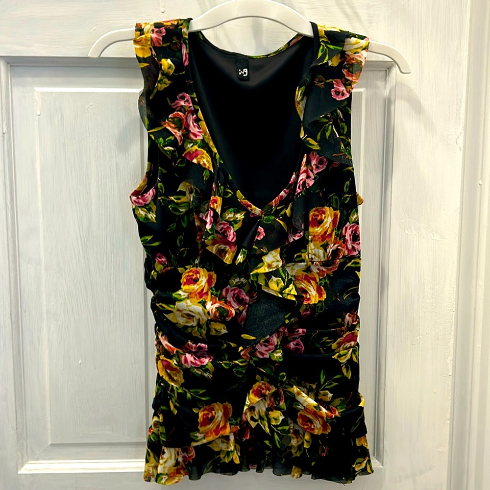 Colorful rushed blouse very flattering grate for under a work jacket.